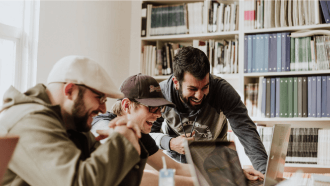 Happy team working in an office.