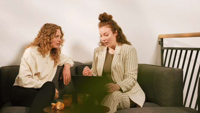 Two working women are in a one on one meeting